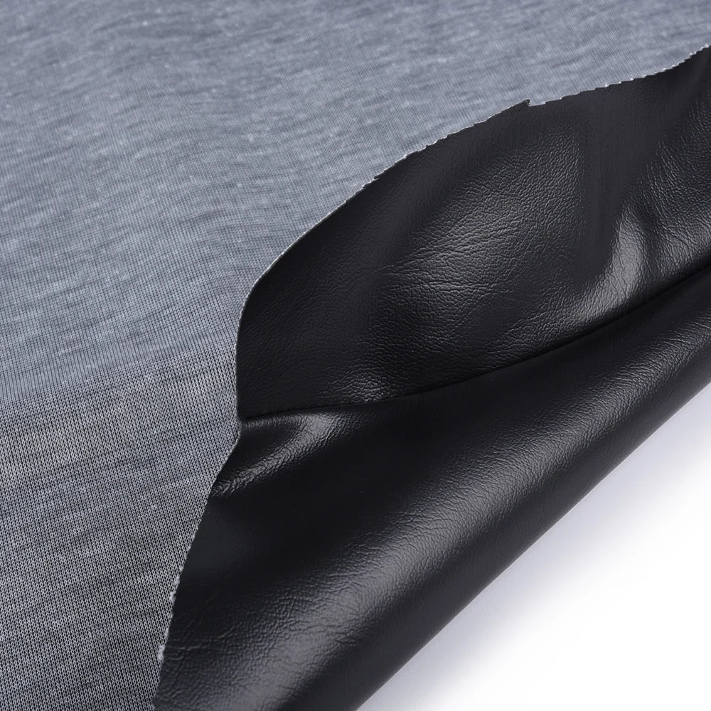 Black leather seat cover for a Honda Fourtrax 300 ATV, shown in a close-up view.