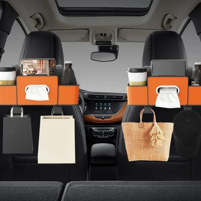 Interior view of a car seat back organizer storage box with compartments for bags and items.