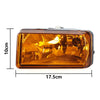 Aftermarket bumper fog light assembly with a clear amber lens and housing.
