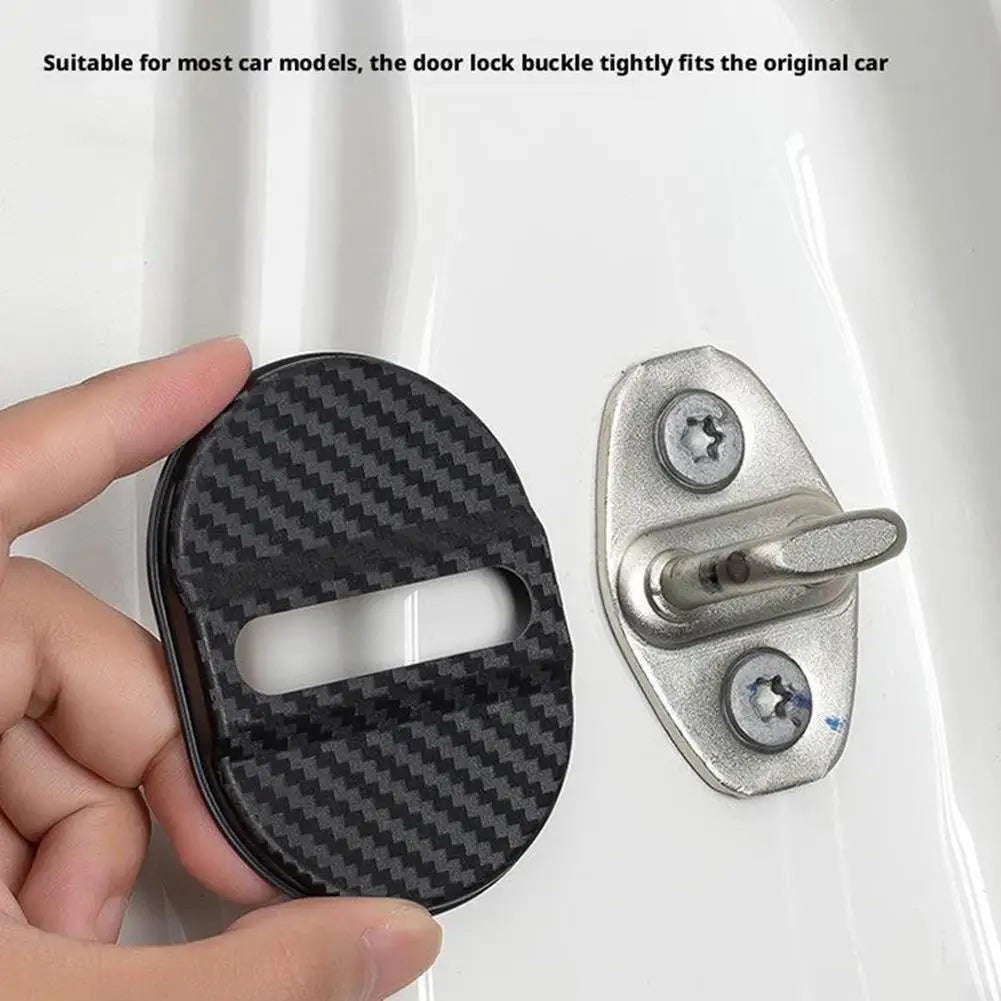 A hand holds a black carbon fiber door lock buckle and a silver door lock mechanism for car use.