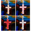 Four images of stainless steel cross pendants in pink, red, and clear crystal designs hanging from a chain.