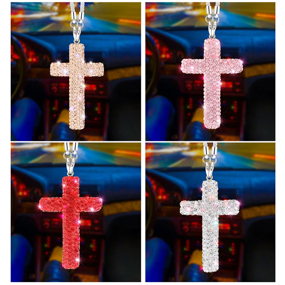 Four images of stainless steel cross pendants in pink, red, and clear crystal designs hanging from a chain.