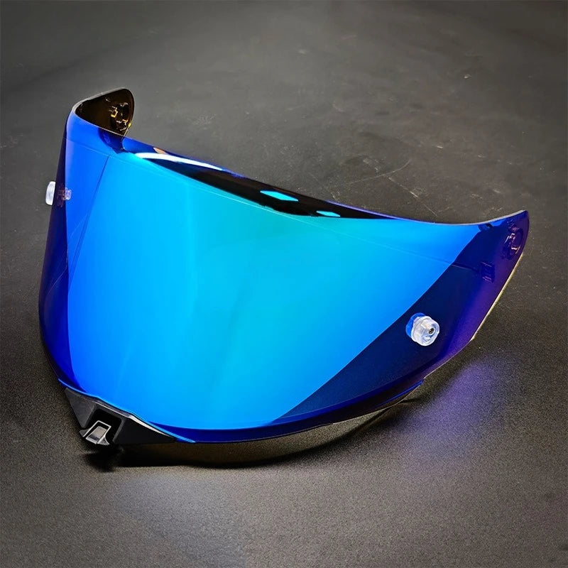 A clear blue replacement motorcycle helmet visor for a KYT TT Revo motorcycle.