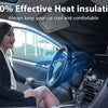 A woman is driving a car with a foldable windshield sunshade installed, showing effective heat insulation.