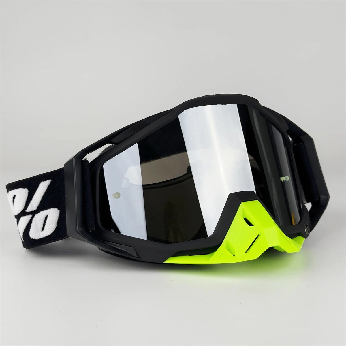 Black and neon yellow off-road motorcycle riding goggles with a black strap and clear lenses