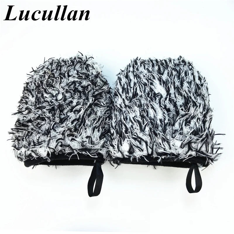 A pair of black microfiber detailing wash mitts with fluffy gray and white synthetic fur texture.