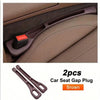 Two brown car seat gap plugs used to fill the space between car seats.