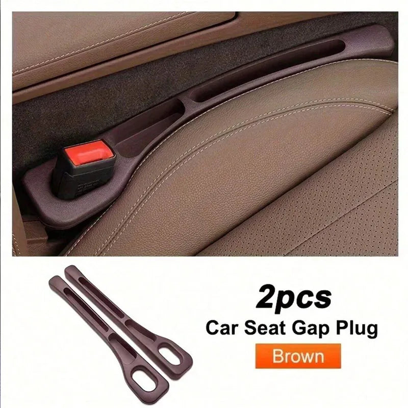 Two brown car seat gap plugs used to fill the space between car seats.
