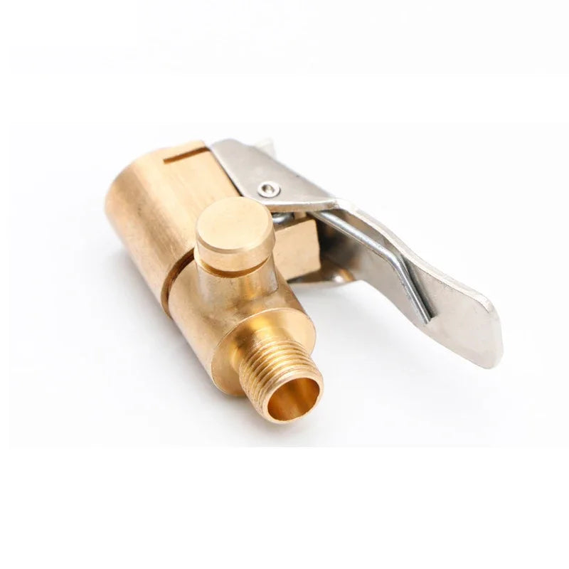 A brass portable inflatable tire pump with a metal handle and nozzle.
