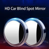 A pair of round HD car blind spot mirrors shown against a dark background.