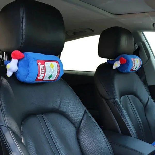 A set of car neck and lumbar pillows featuring blue fabric with a red nose and NOS branding placed on black car seats.