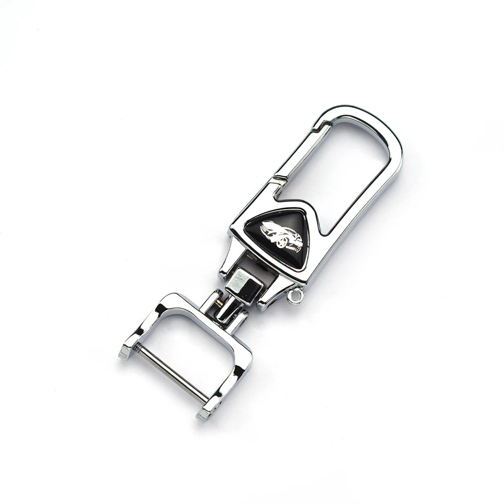 Silver universal car key case cover with a protective plastic insert and metal clasp.