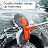 An orange double-headed car wash mop with a rotating brush cleaning water off a car surface.