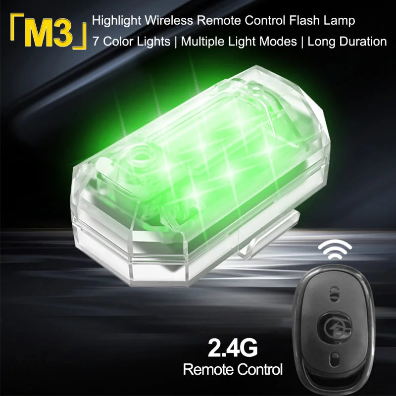 A clear wireless remote control flash lamp with a black remote, showing a green light.