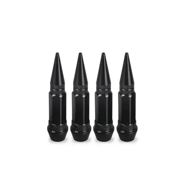 A set of four black aluminum tire valve stem caps.