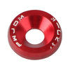 A close-up view of a red aluminum fender washer or bolt from an M6 fastener kit.