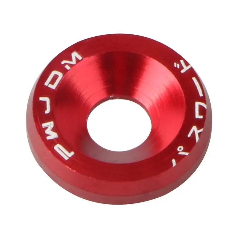 A close-up view of a red aluminum fender washer or bolt from an M6 fastener kit.