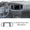 Carbon fiber interior trim kit for a Dodge Charger dashboard and steering wheel.