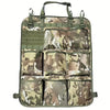 A green and brown camouflage seat back organizer with multiple compartments for storage.