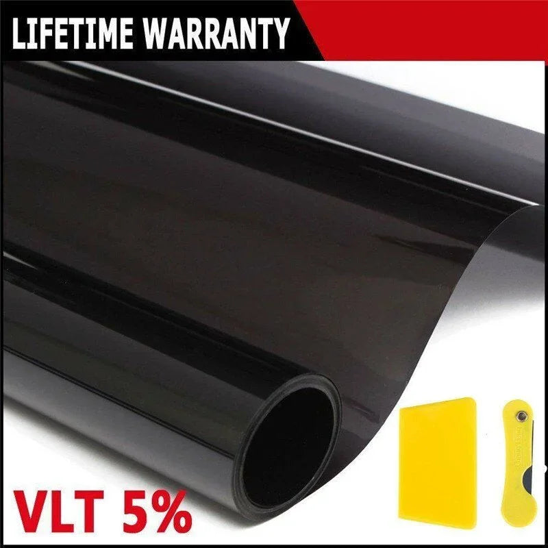 Roll of black window tint film with a yellow label showing VLT 5% for sun protection