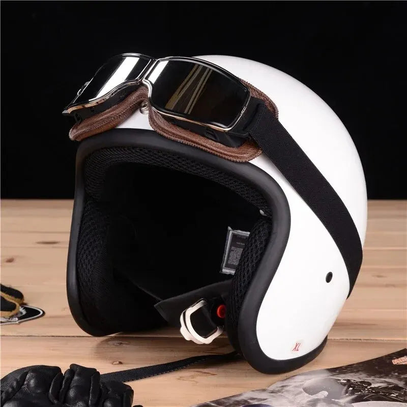 A white retro folding motorcycle windproof helmet is shown on a wooden surface.