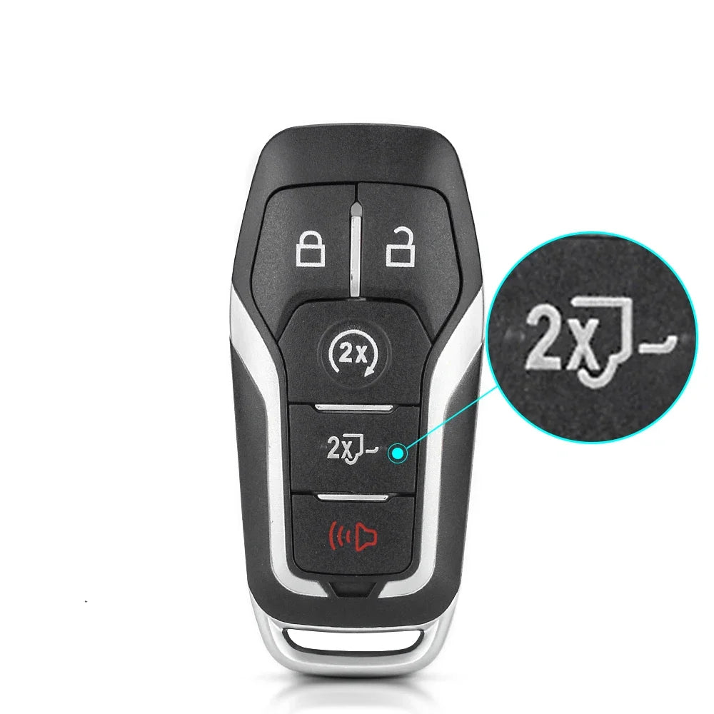 A black key shell replacement case with multiple buttons and a circular inset showing a 2x function.