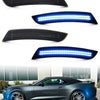 Blue LED turn signal lights installed on a dark blue Camaro.