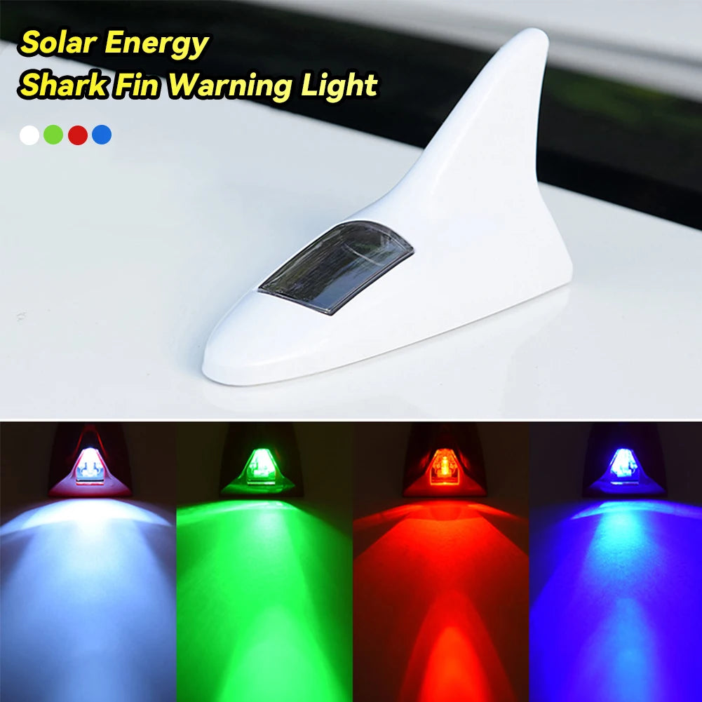 A white solar energy shark fin warning light device shown in various colored illumination modes.