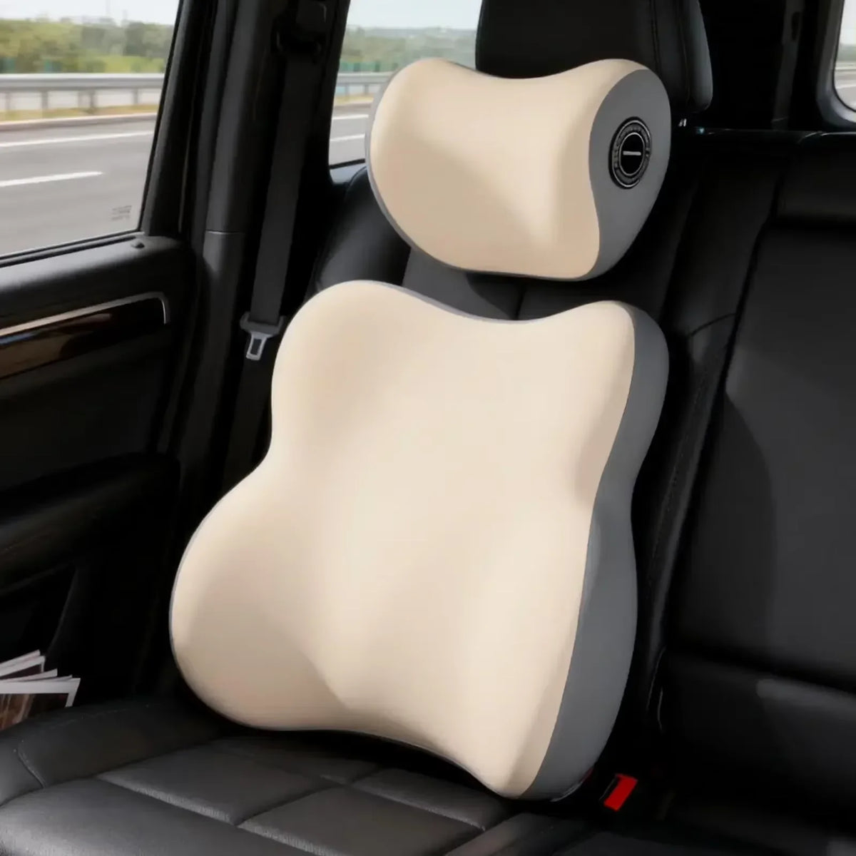 Ergonomic memory foam car neck and lumbar support pillow installed in a vehicle seat.