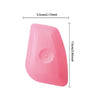 A pink plastic car window tint kit with dimensions 5.5cm by 7.5cm.