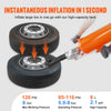A hand is using an orange professional handheld tire inflator to inflate a large tire.