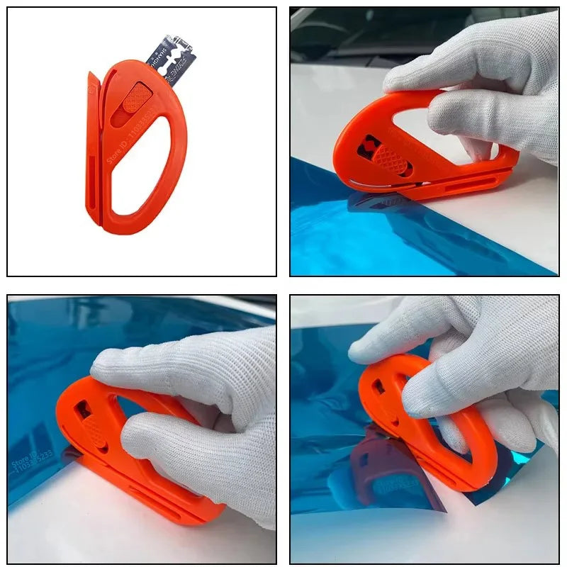 Orange professional car vinyl wrap tool kit being used to apply a protective film to a vehicle surface.