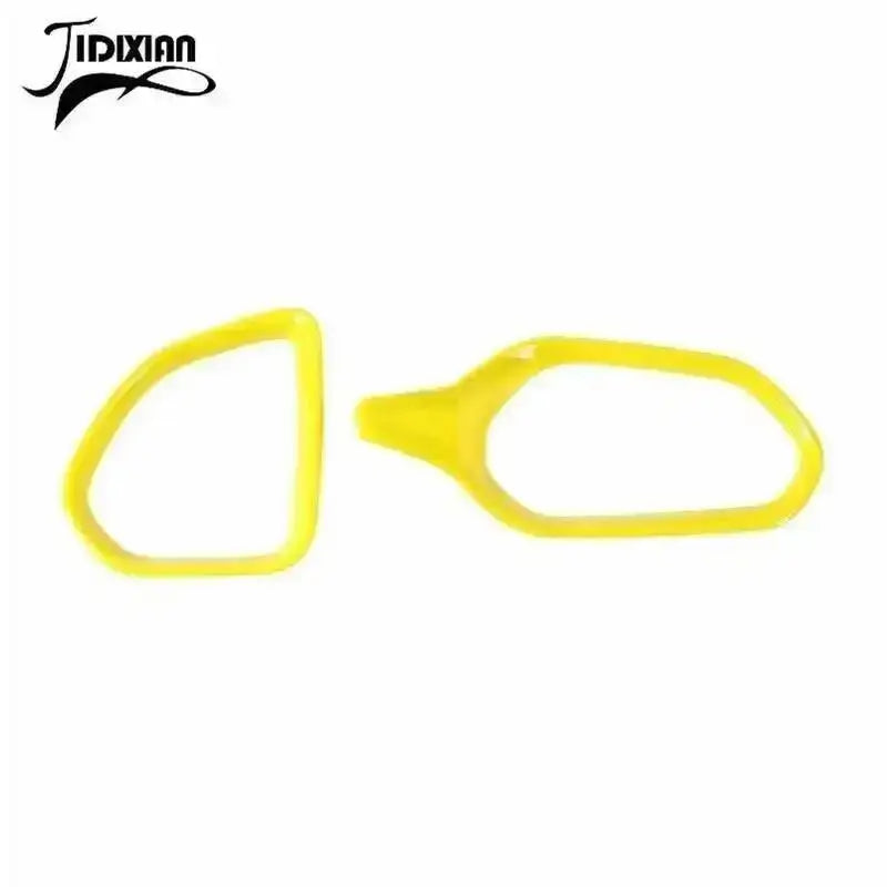 A pair of yellow dashboard air vent covers for a Jeep Renegade, shown against a white background.