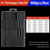 A box of 400 pieces of 3:1 shrinkage tubing kit with various diameters and lengths of black heat shrink tubing.