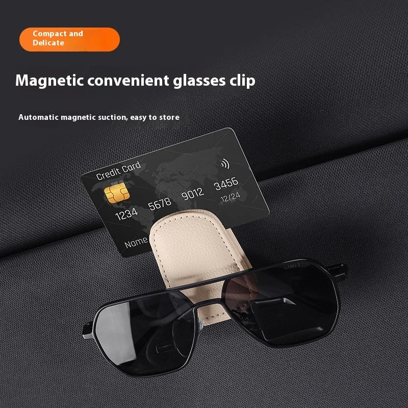 Magnetic convenient glasses clip showing a credit card and sunglasses being held by a magnetic clip.