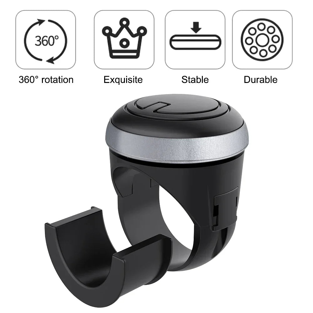 A black universal steering wheel booster knob with a silver accent, shown next to features like 360 rotation, exquisite desig