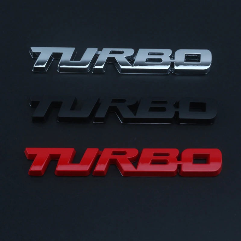 Three metallic badges spelling TURBO in silver, black, and red on a dark background.