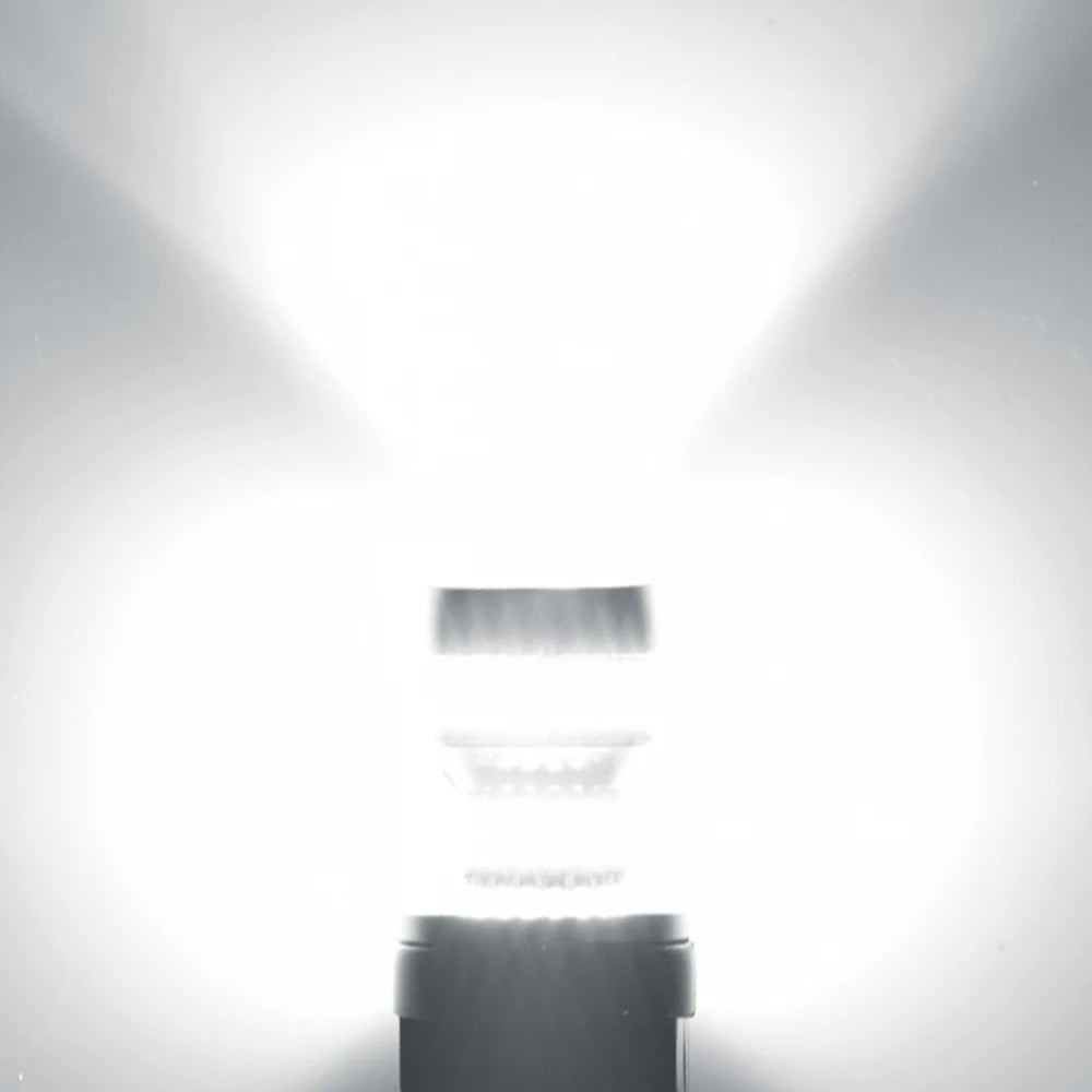 A close-up view of a universal LED car bulb set for brake, tail, and reverse lights.