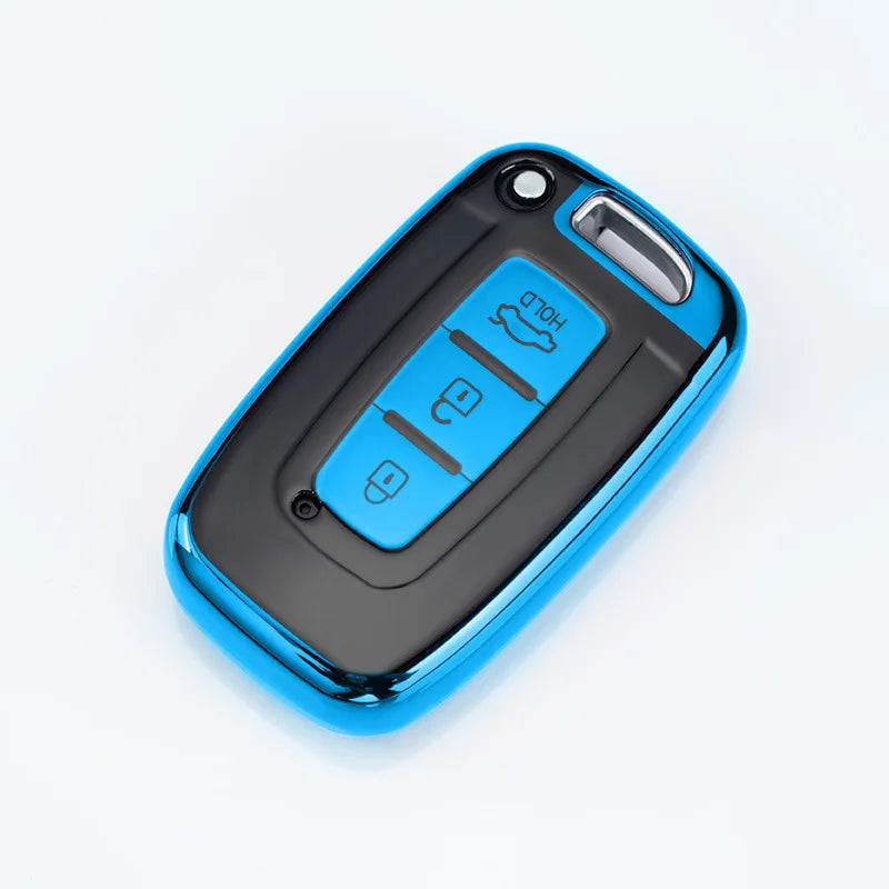 A blue and black universal car key case cover with a sliding mechanism for multiple models.