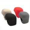 Three car gear shift knob covers in beige, red, and black shown from above.