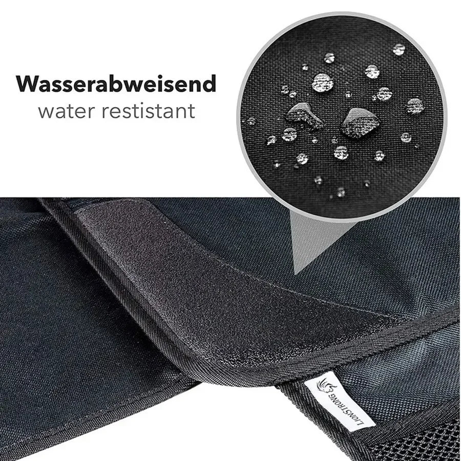 Close-up view of a black car seat protector pad demonstrating water resistance.