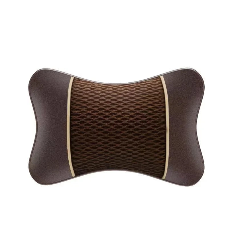 A brown universal car headrest pillow with a textured fabric cover.