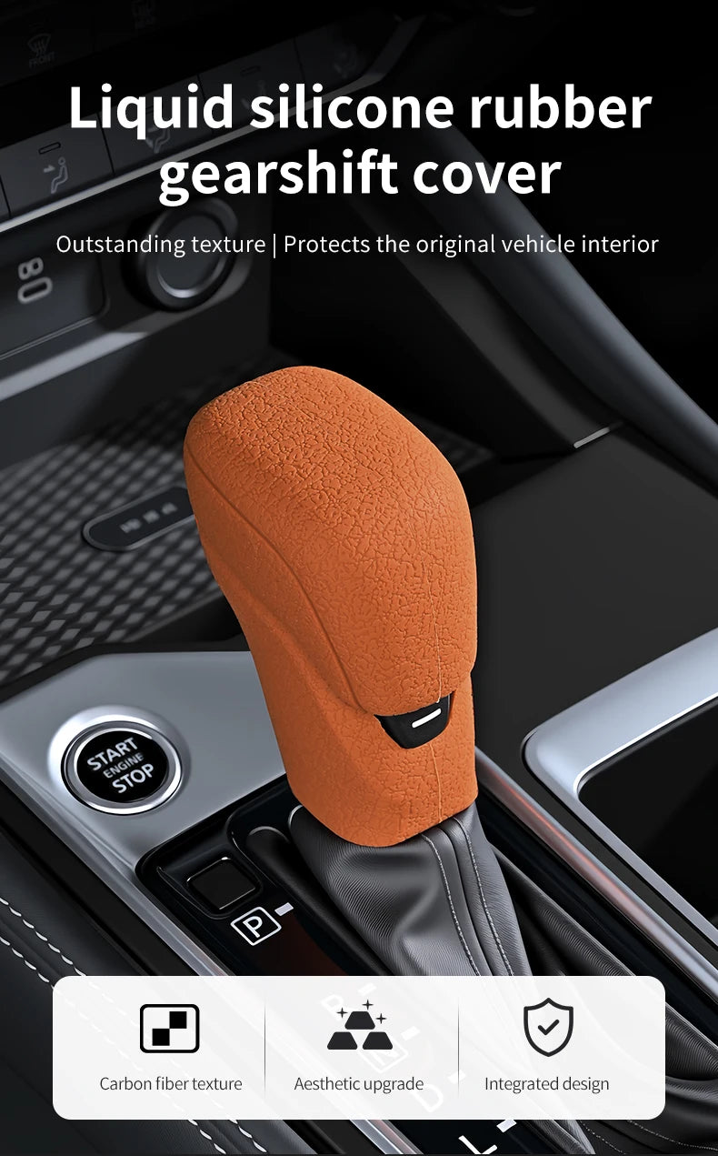 An orange liquid silicone rubber gearshift cover is shown installed on a vehicle's gear shift column.