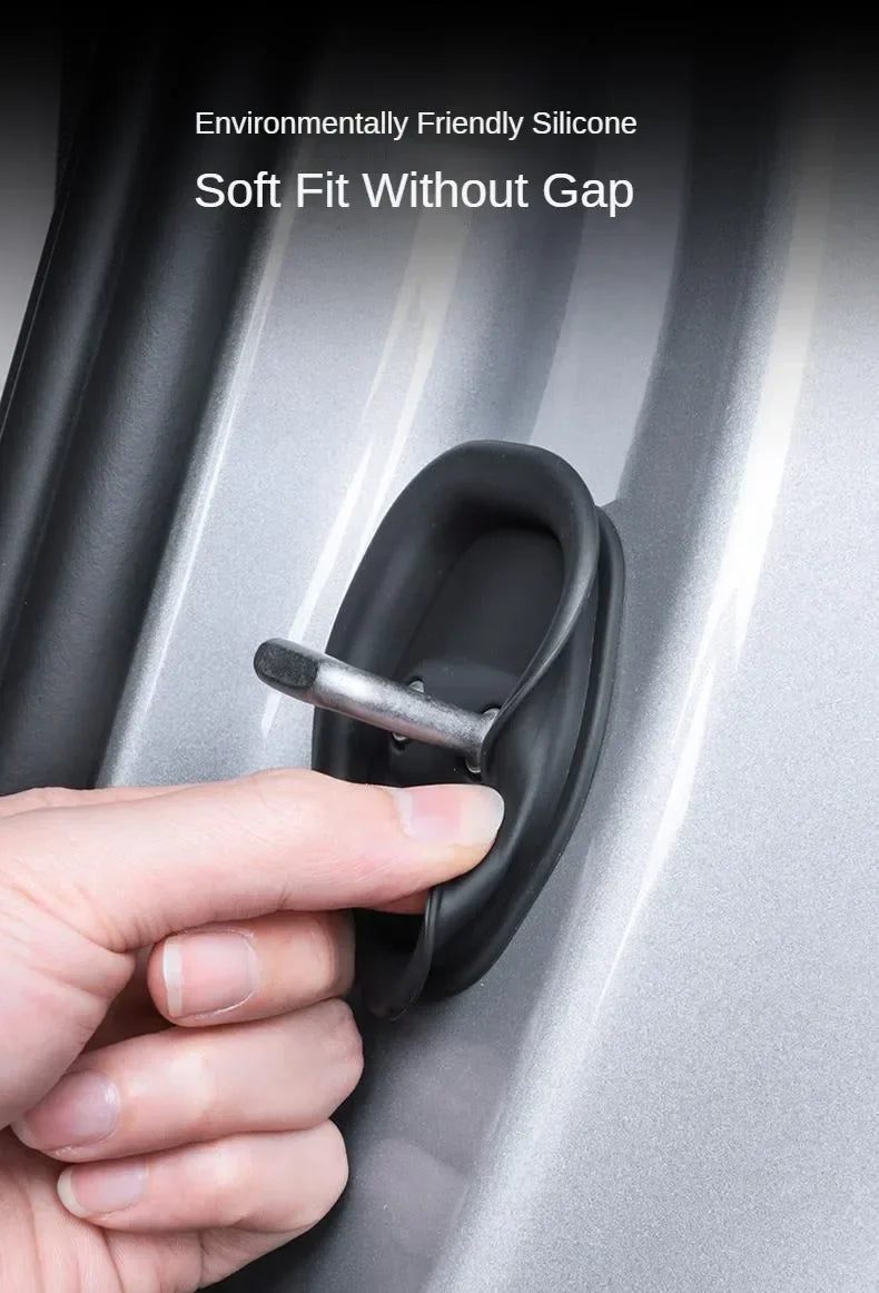 A hand is operating a soft fit silicone door damping guard on a car door.