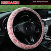 Leopard print plush steering wheel cover installed in a car interior.