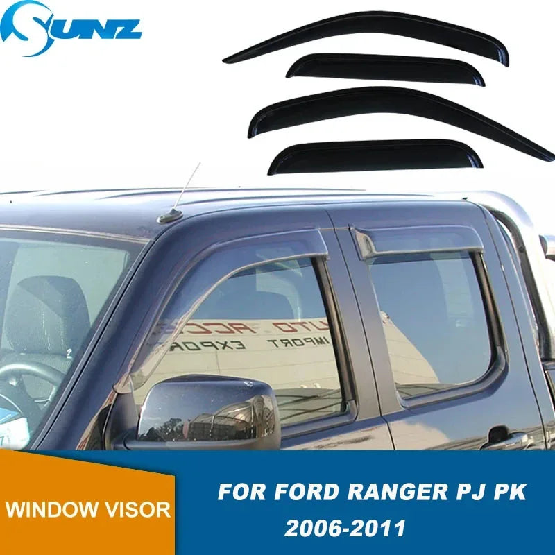 Black in-channel window visors installed on the side of a Ford Ranger truck.