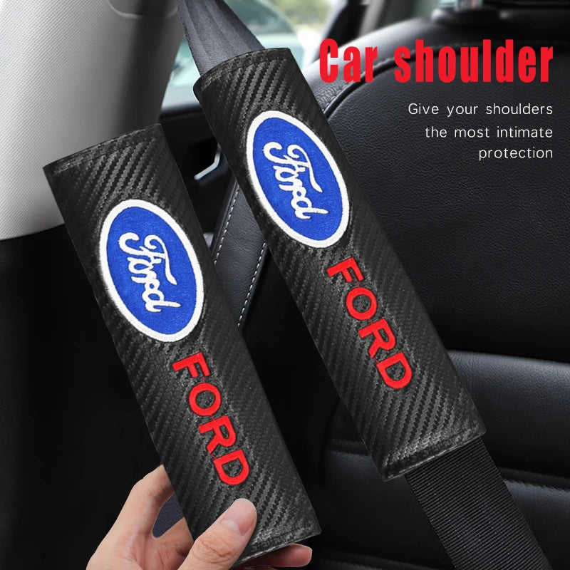 A black carbon fiber shoulder pad cover for a Ford car seat, showing the Ford logo and red text.