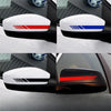 Close-up view of universal car racing stripe decals applied to side mirrors, featuring red and blue accents.