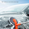 An orange double-headed rotating car wash mop is cleaning the surface of a car's hood.