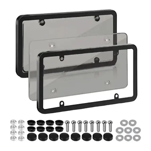 A set of license plate protectors including a main plate and various mounting hardware for US/Canada vehicles